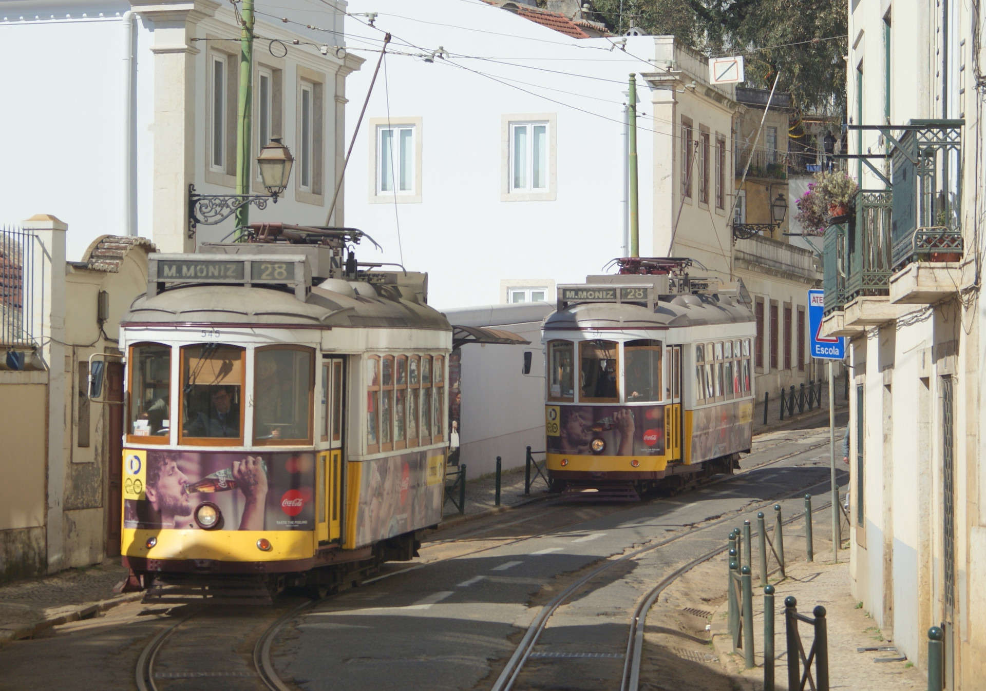 Carris Eléctrico car no. 545 on route 28 at R.Escolas Gerais, Lisboa, followed by car No. 577, 05/03/2016